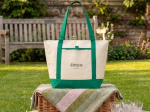Cooler bag, rug and corkscrew